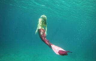 Island Mermaids Swimming with a Pink Mermaid Tail in Gili T