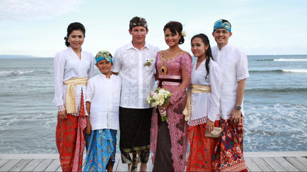 Ayun and Martyn's family pairing white tops with traditional sarongs