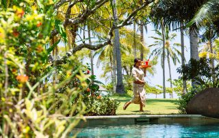 The Anandita Lombok villa staff serving fresh juice