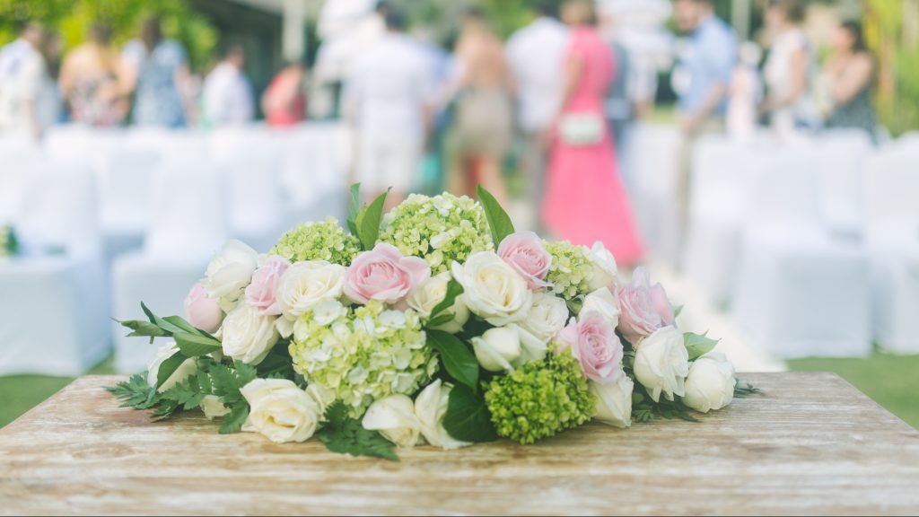Pink and white roses with green hydrangea