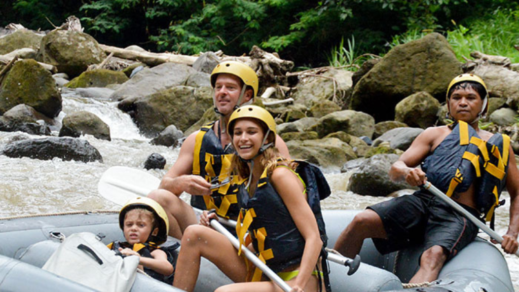 Family Conquering Rapids with Mason Adventures