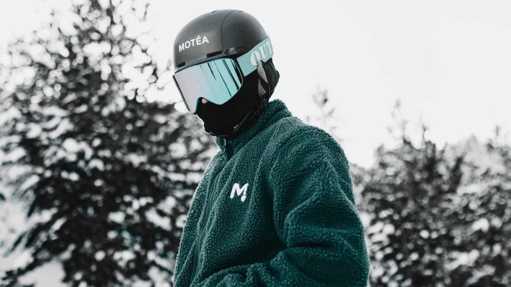 Man wearing winter gear and helmet